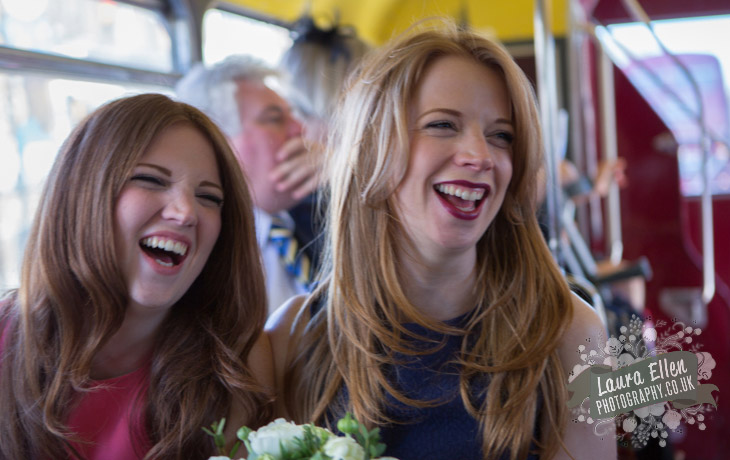 Bridesmaids laughing on Routemaster